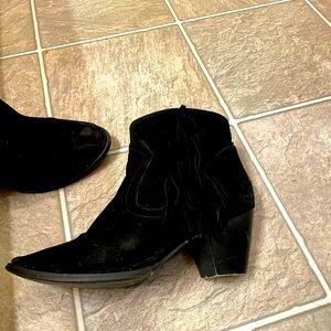 Black booties with fringe on side
